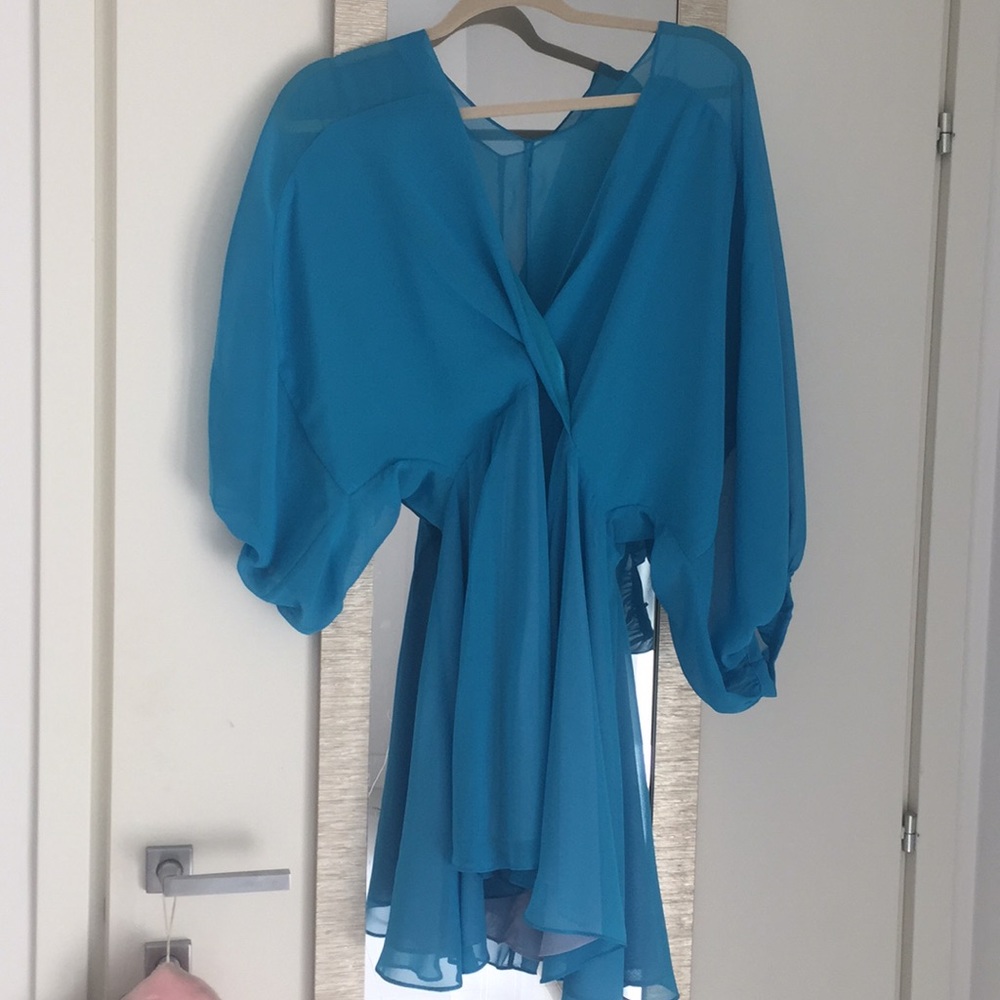 Party dress with sleeves. Never been worn